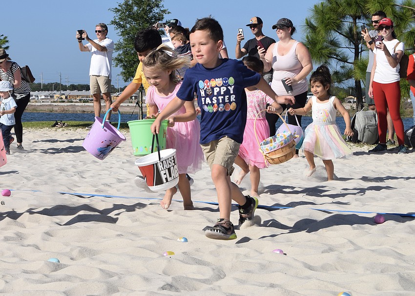 Lakewood Ranch 5-year-old Brayden LaBonte makes a mad dash for the eggs at his first EGGstravaganza.