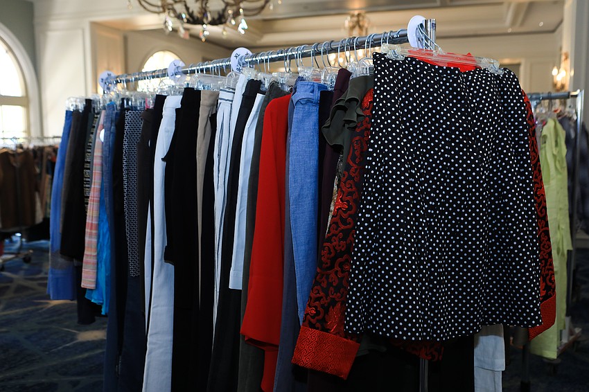 Guests shopped for clothes before the program started.