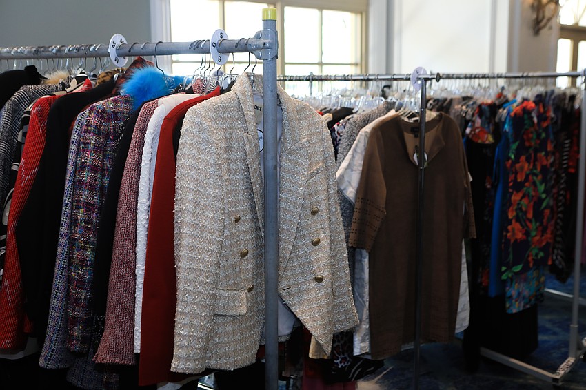 Guests shopped for clothes before the program started.