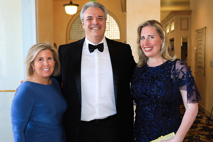 Carol Lackey with Rob and Jennifer Rominiecki