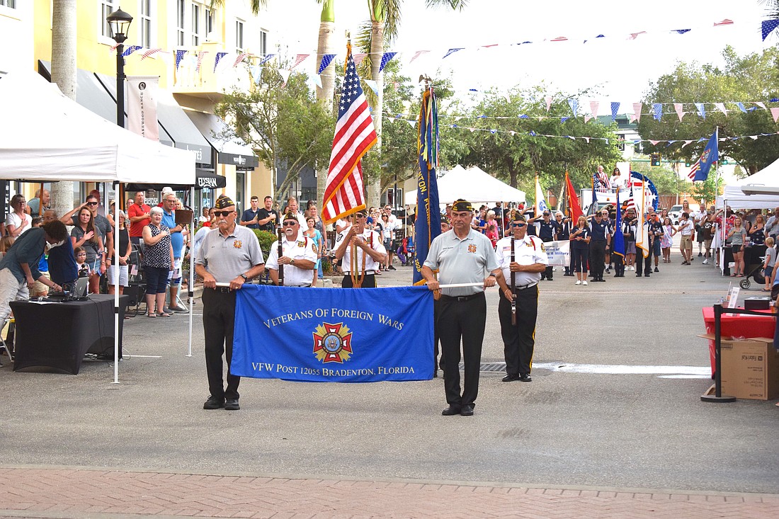 The VFW Braden River Post 12055 marches in the 2022 Tribute to Heroes Parade.