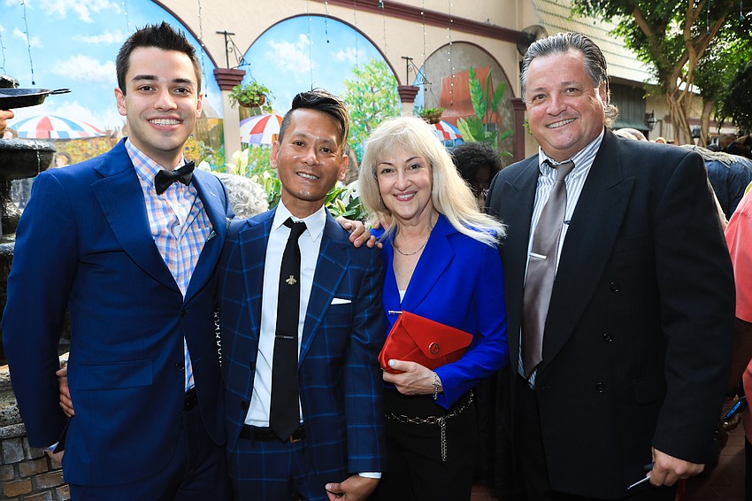 Jason Klamson and Jeffrey Karasawa with Elizabeth and Dino Klamson