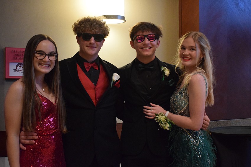 Juniors Lourdes Capote-Dishaw and Chase Dougal and seniors Ethan McKay and Morgan Sowards are excited to be at prom. 