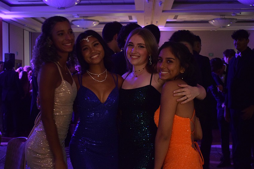 Seniors Justline Torres, Breanna Relao, Lily Johns and Mia Breiding have fun at one of their last big moments of high school. 