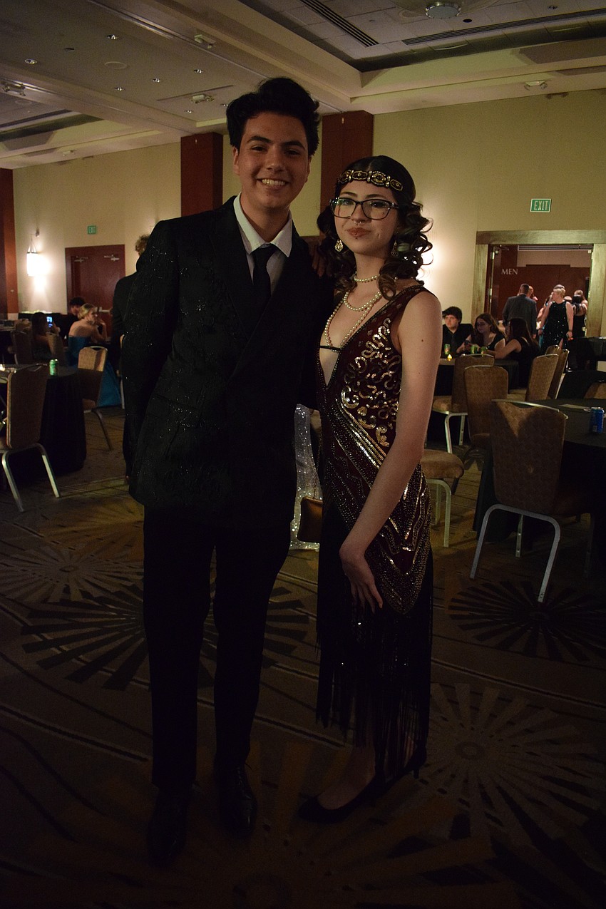 Junior Eliel Chavez and senior Eliana Salazar embrace the 