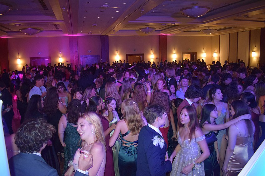 Braden River High School students hit the dance floor during the prom at the Hyatt Regency in Sarasota.