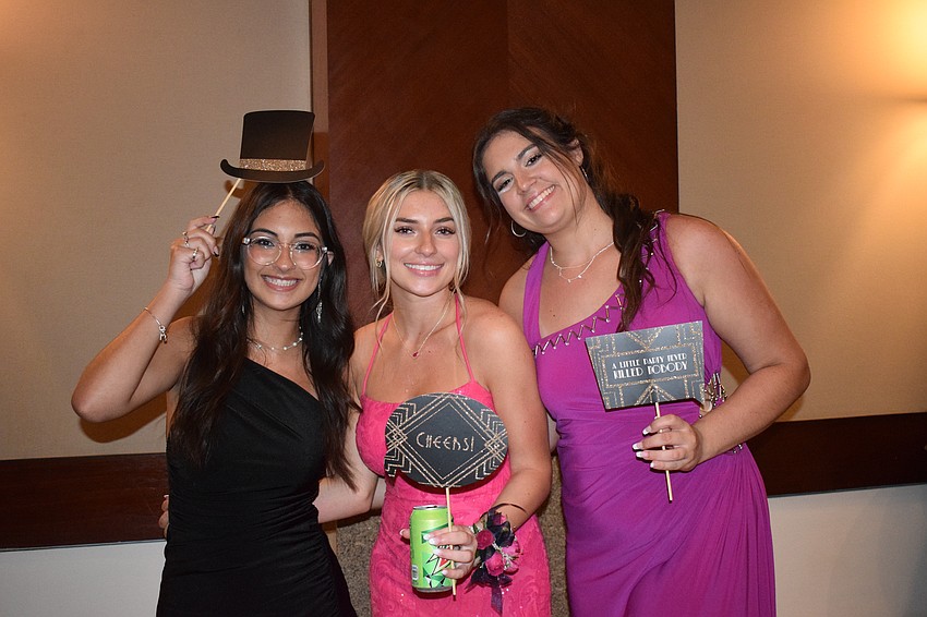 Seniors Gabrielle Odicio, Madison Tamburin and Declan Hudson make the most of their prom.