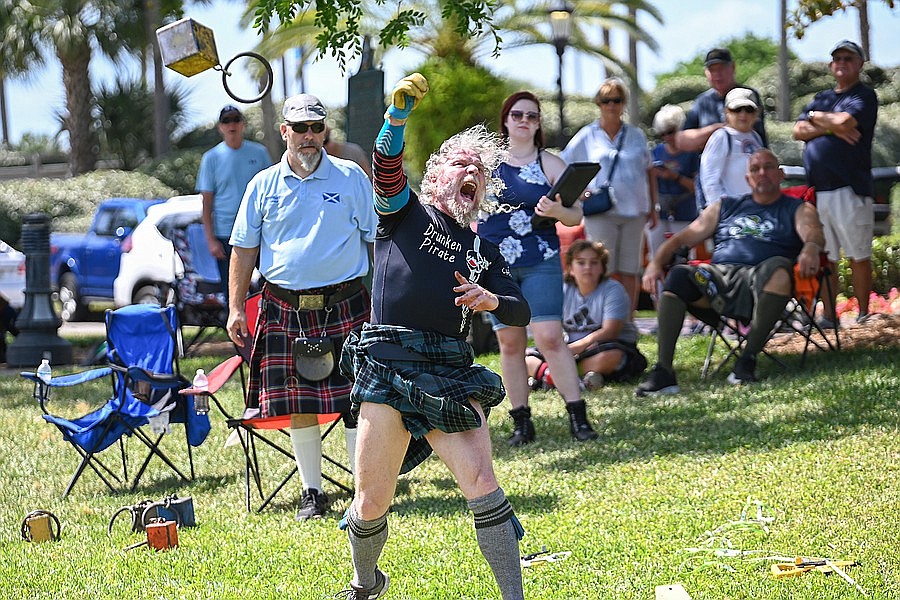 Scottish Heavy Athletic Competition athlete Ching throws for distance at the 2022 Celtic Festival. File photo by Michele Meyers