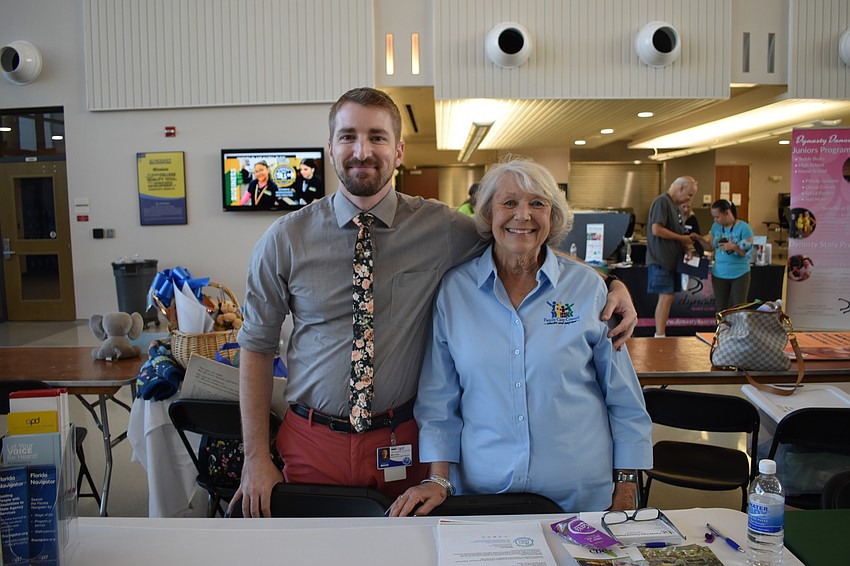 Mike Lacey of Florida Agency for Persons With Disabilities and Pauline Lipps of Sarasota's local Family Care Council