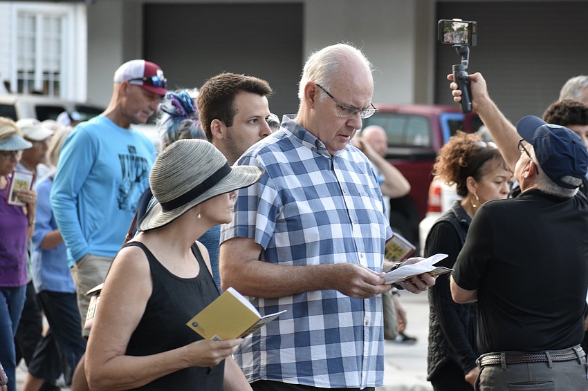 Sharon and John Marshall follow the crowds on Main Street.