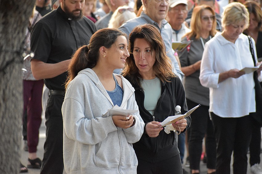 17-year-old Sofia Giannella and her mother Rose Giannella exchange a few words during the event.