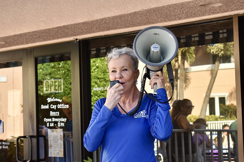General Manager Lyn Sorensen informs the crowd that the Easter Bunny is on his way.