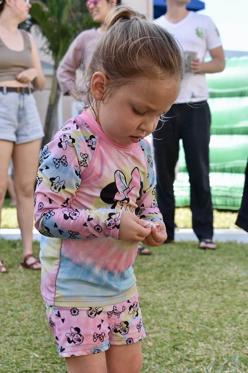 Alaina Conrow takes a candy break.