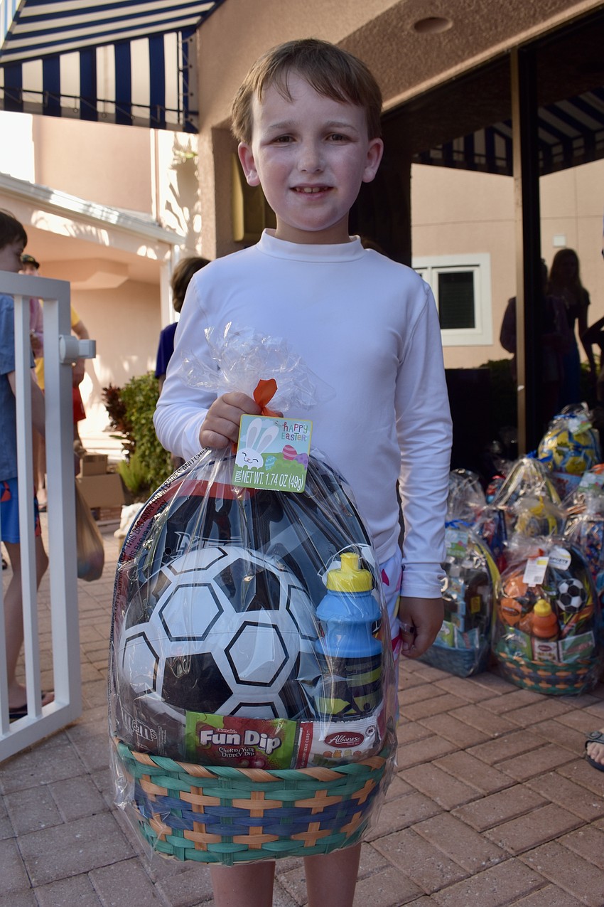 Lucas Strong picks a soccer themed Easter basket.