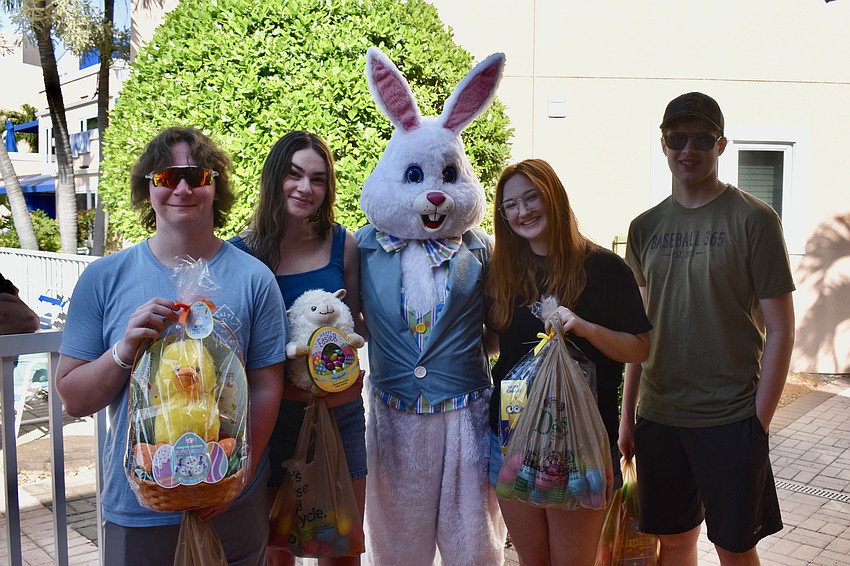 Teenagers Nick and Katherine Bariteau, Kelly Olson and Aaron Kiner get in on the fun too.