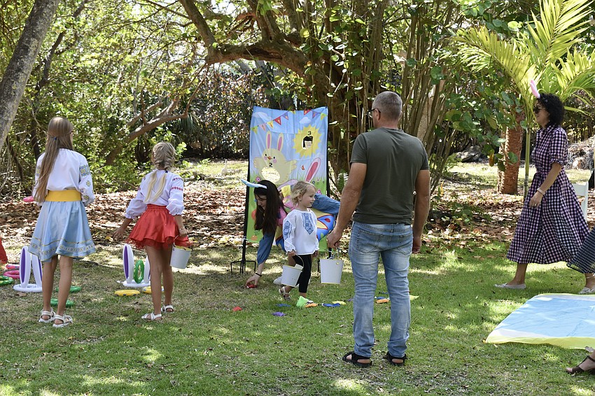 Easter games are set up on the lawn.