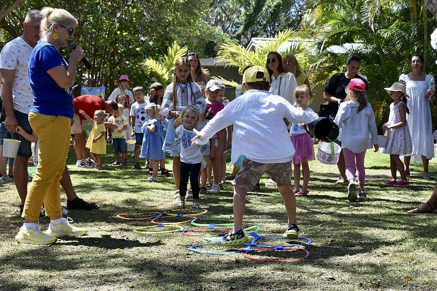 The children play hopscotch.