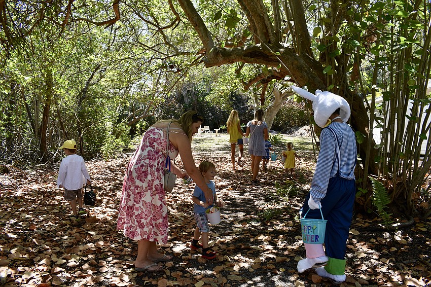 The kids go on an egg hunt around the garden.