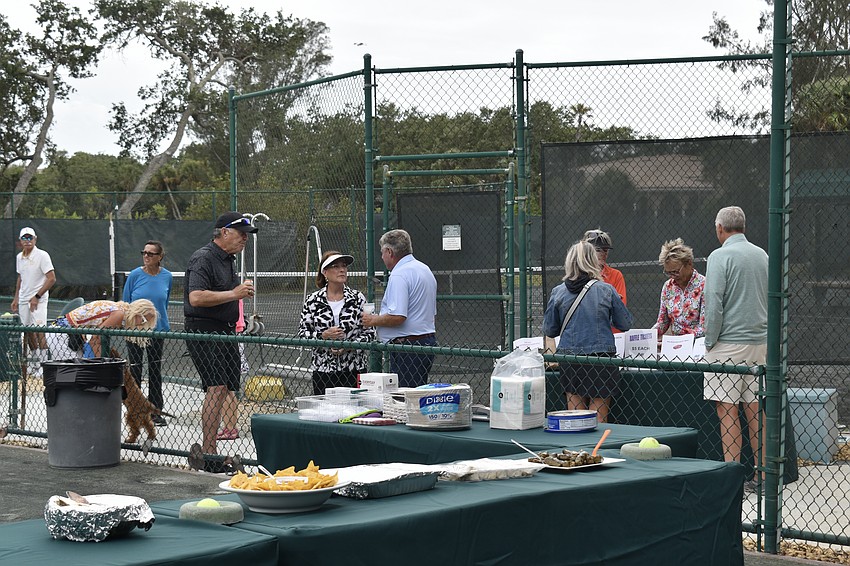 The goodbye potluck dinner at the Longboat Key Public Tennis Center is an annual tradition.