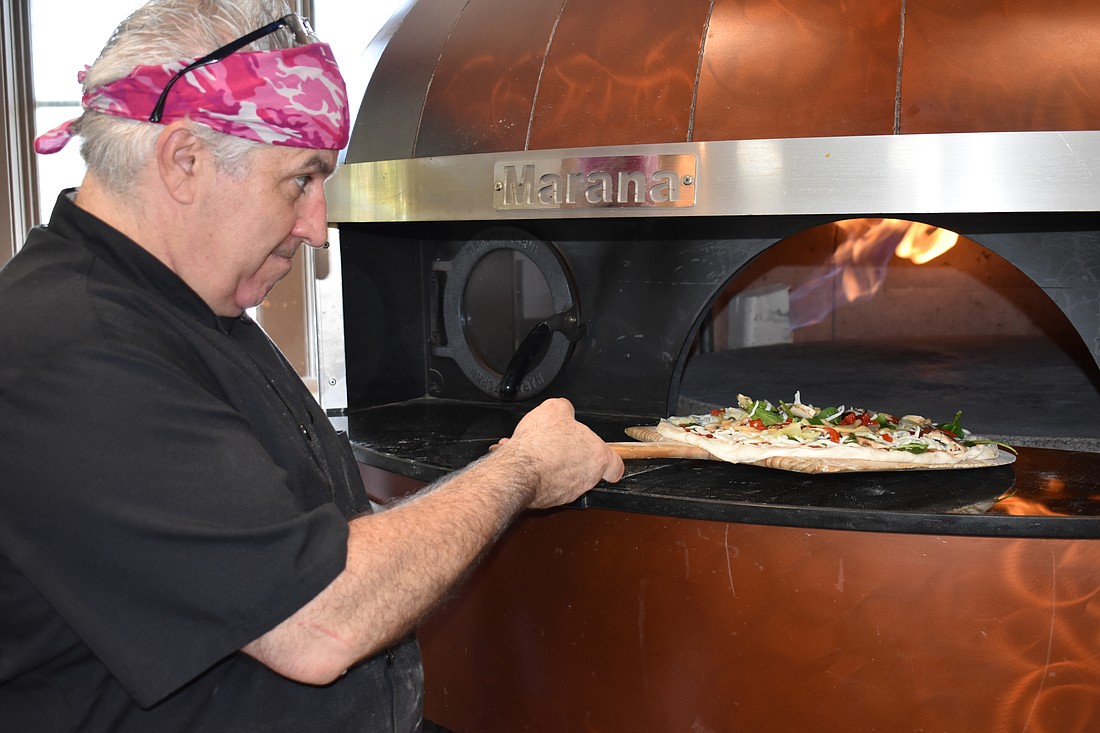 David Spagnuolo said he had never used a Marana rotary pizza oven before coming to the King's Corner at Legacy Golf Club. He said it is "odd, but helpful."