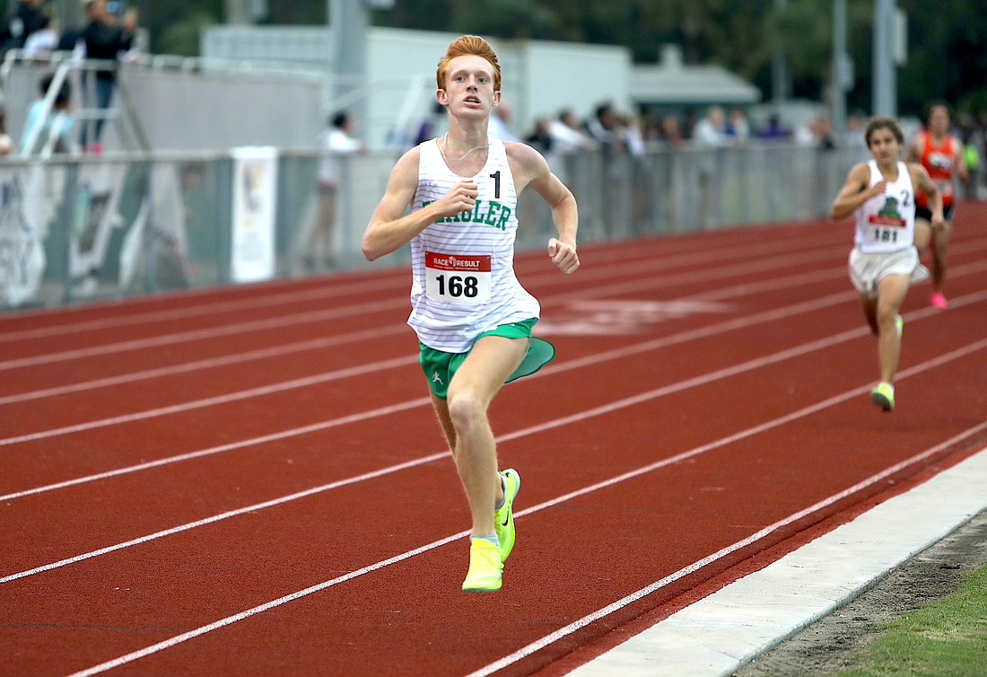 FPC senior Zach Spooner (168), here running at the Five Star Conference meet on April 12, ran a personal record 9:15.40 in the 3,200 at the Region 1-4A meet on May 5. File photo by Brent Woronoff