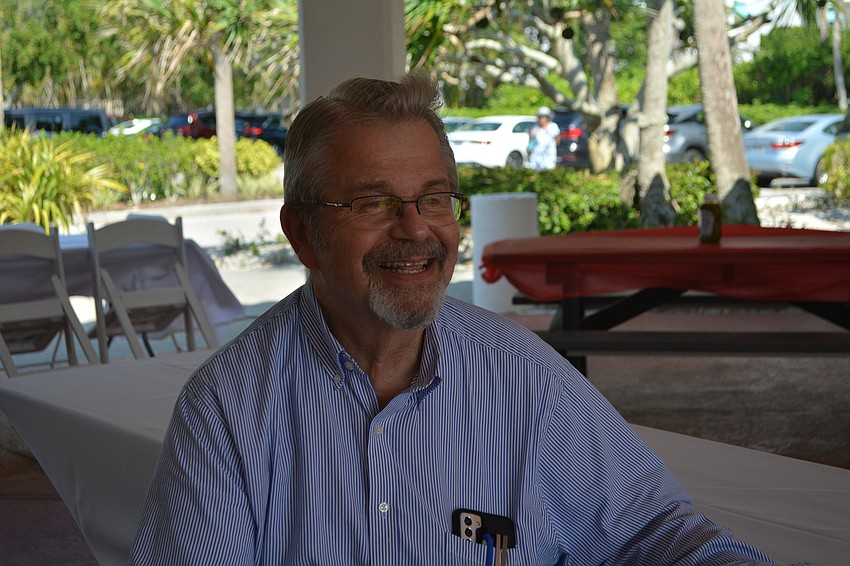 Rabbi Stephen Sniderman mingles with Temple Beth Israel members at the beach barbecue on Sunday, April 16.
