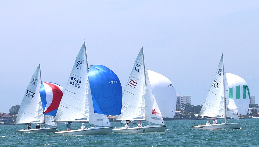 Full sails and spinnakers come out at the Bird Key Yacht Club Sarasota Bay Cup Regatta.