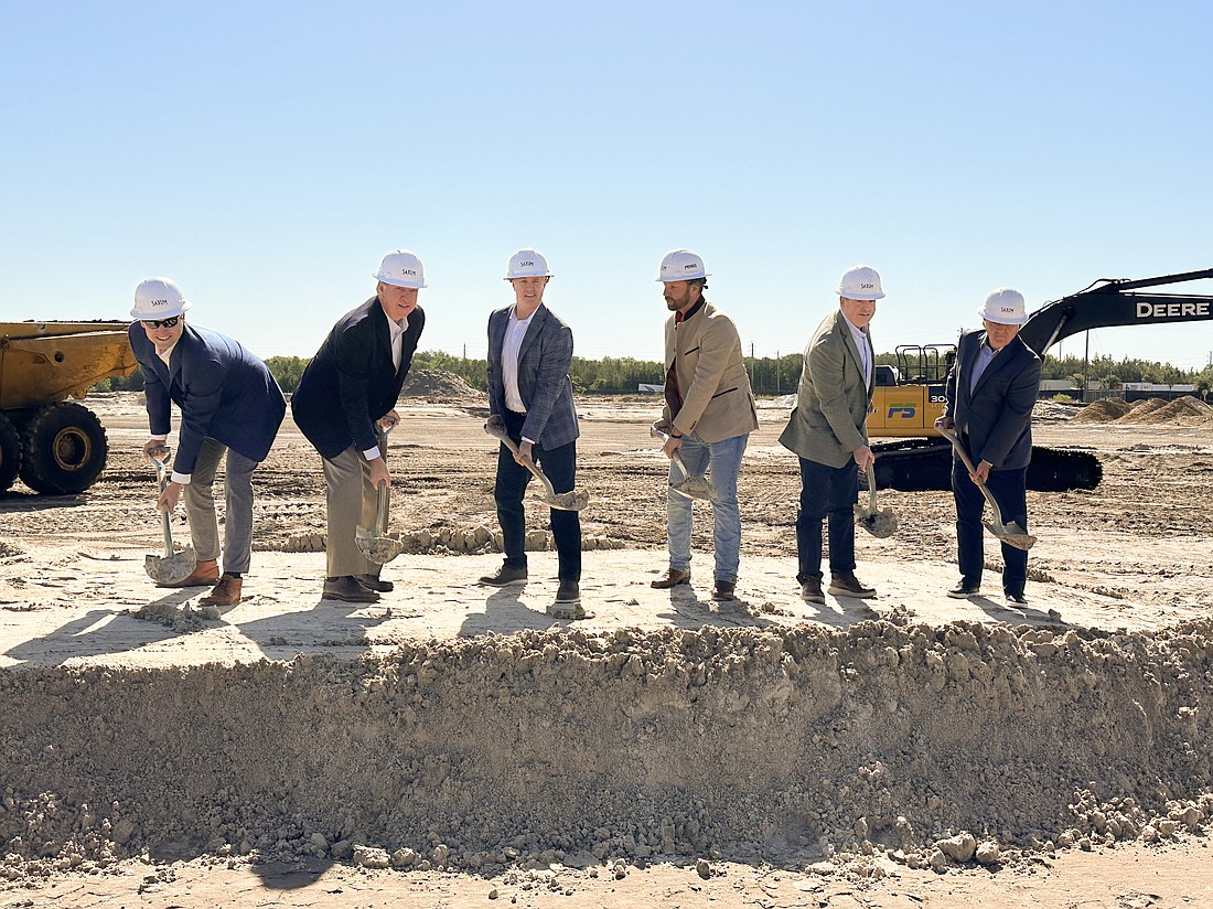 Representatives of the developers of the Arcadia Cold Storage & Logistics project ceremonially turn dirt at the groundbreaking event April 18.