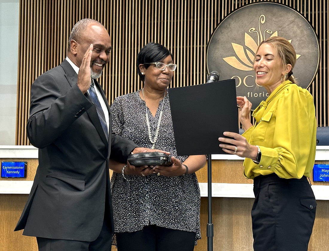 Ages Hart was sworn in as District 4 Commissioner during the Ocoee Commission meeting Tuesday, April 18, alongside his wife, Lori Hart.