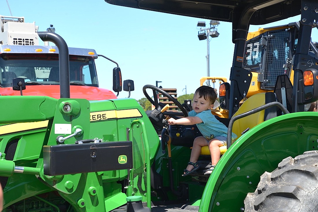Kids can sit in the driver's seat of big tractors and trucks at the 27th annual Big Truck Day.