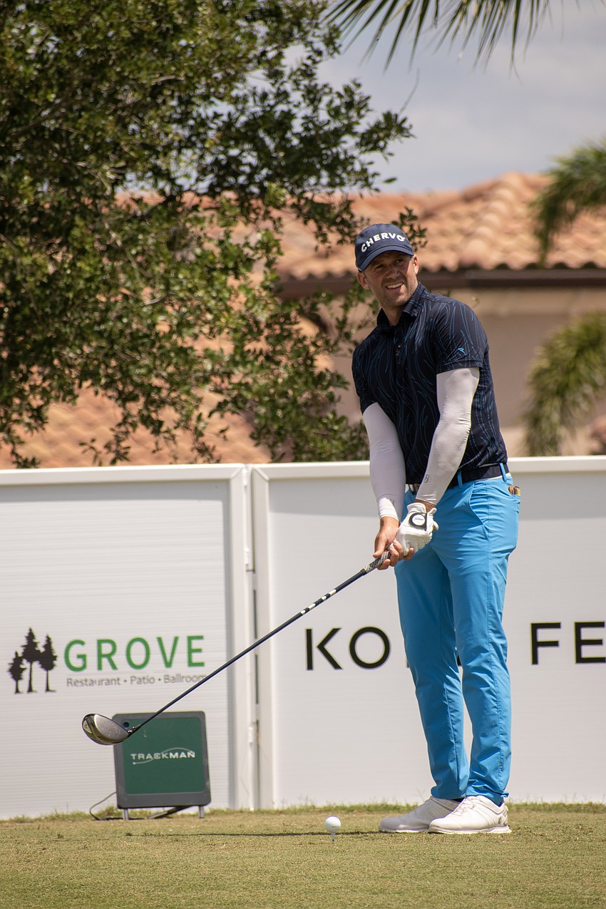 Ben Silverman preps his tee shot on the No. 18 hole at Lakewood National. 
Silverman shot seven under par in round one of the 2023 LECOM Suncoast Classic.