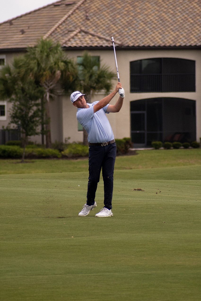 Trace Crowe hits his second shot on the No. 18 hole at Lakewood National. Crowe shot seven under par in round two of the 2023 LECOM Suncoast Classic and is eight under par for the tournament.