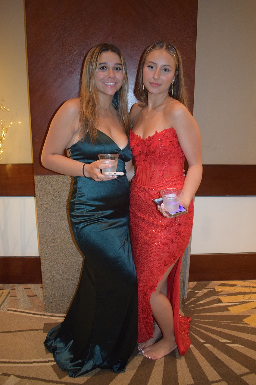 Seniors Yasmeen Soares and Stephanie Freisz are well dressed for the occasion.