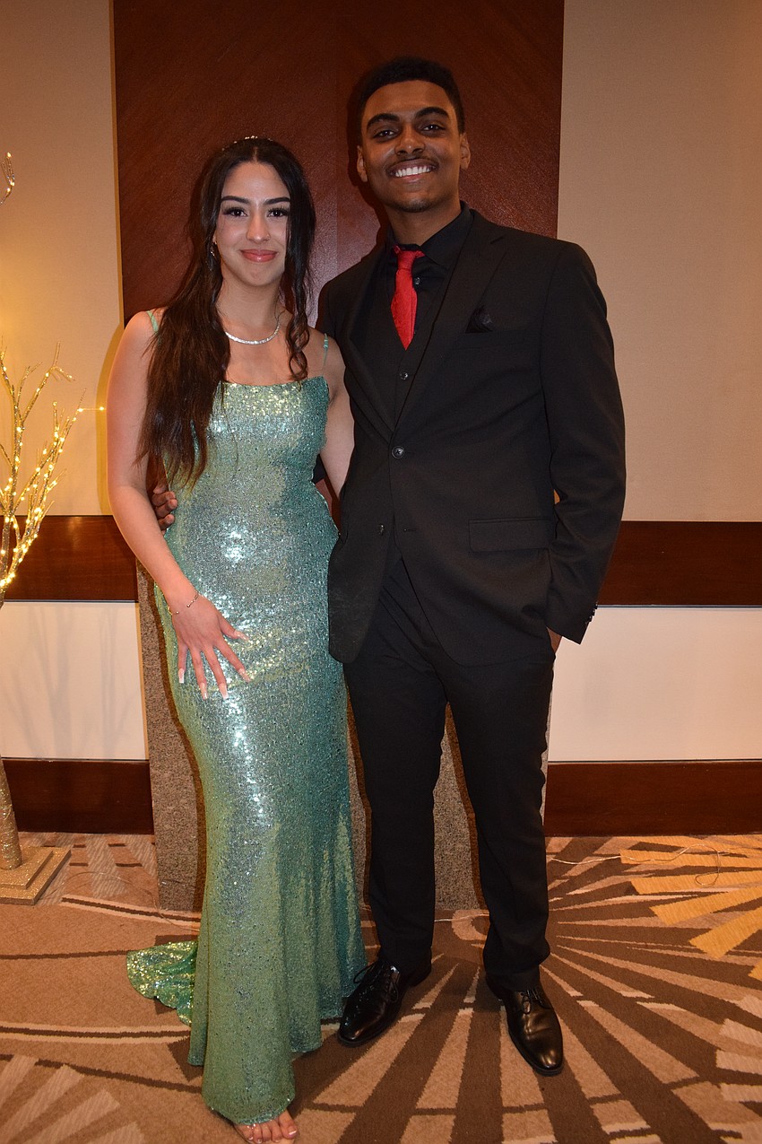 Seniors Valeria Erazo and Muda Osman show off their style at the prom.