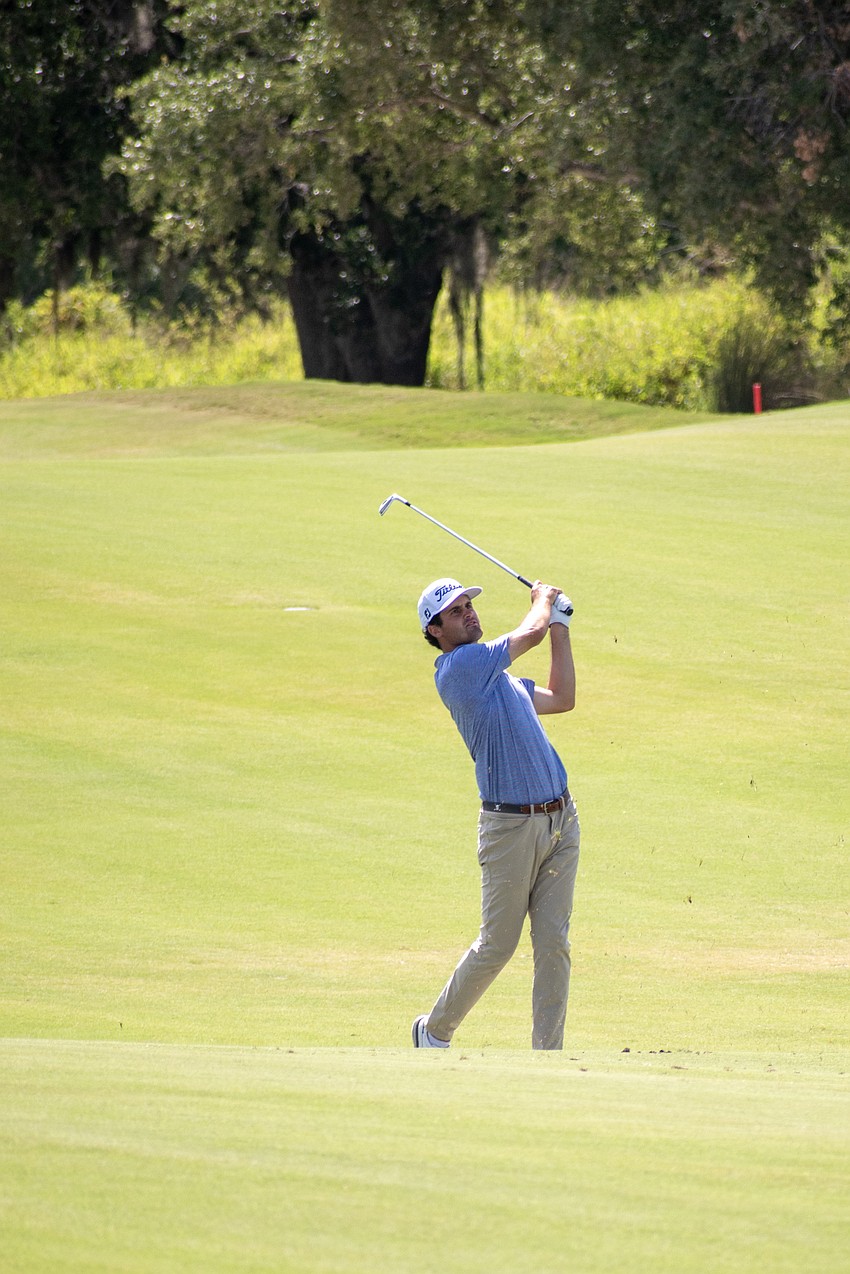 Jackson Suber hits his second shot on the No. 16 hole at Lakewood National. Suber shot 4 over par in round three of the 2023 LECOM Suncoast Classic and is 8 under par for the tournament.