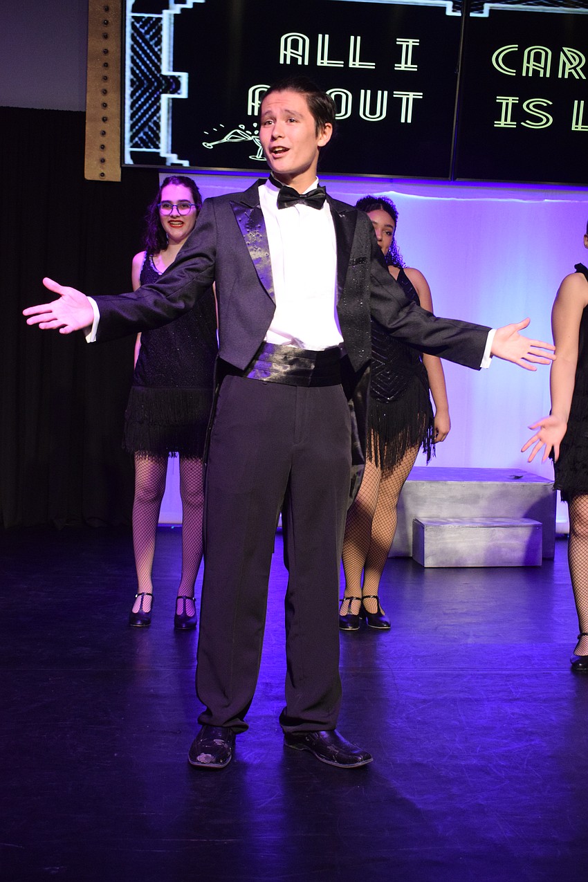 Alan Khusniyarov brings the charisma of Billy Flynn to the stage.