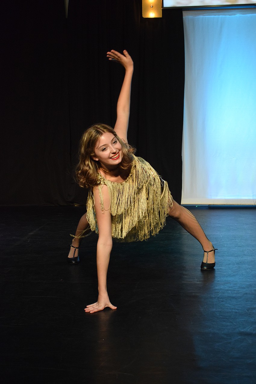 Madelyn Benner, as Roxie, shows off her dance skills in 
