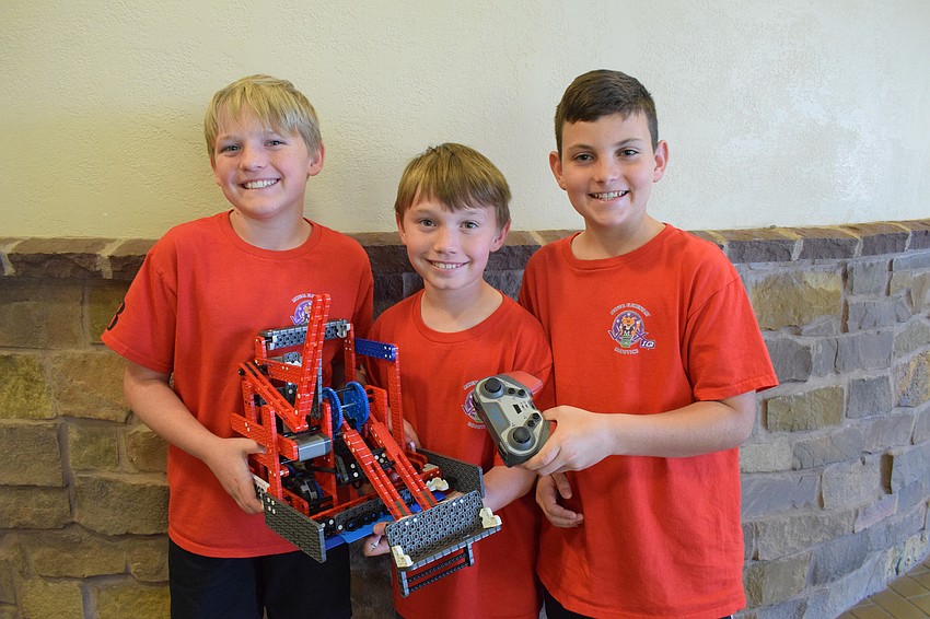 Gilbert W. McNeal Elementary School's Flaming Cheetos VEX team consists of fifth grader Noah Jackson, third grader Penn Reynolds and fifth grader Hayden Laning.