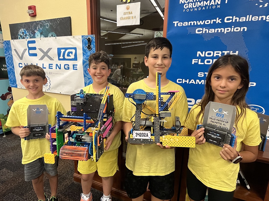 Gilbert W. McNeal Elementary School's Slap 'N' Slide team consists of third grader Parker Poplaski, fifth graders Noble Pinto and Okhan Ozturk and fourth grader Luna Locke.