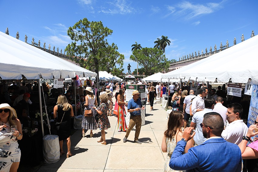 More than 1,000 guests fill the Ringling Museum.
