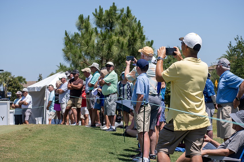 The Suncoast Classic crowd watches the final pairing of Kevin Dougherty and Steve Gutschewski on the No. 1 hole at Lakewood National.