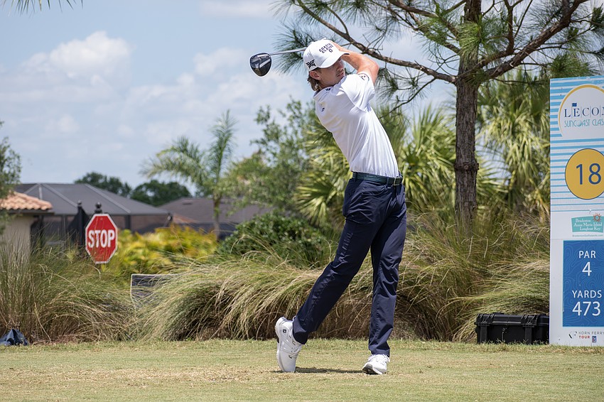 Jake Knapp smashes his tee shot on the No. 18 hole at Lakewood National. Knapp shot 9 under par Sunday and finished the tournament 19 under par.