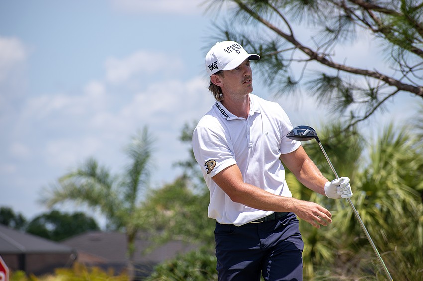Jake Knapp stares at his tee shot on the No. 18 hole at Lakewood National. Knapp shot 9 under par Sunday and finished the tournament 19 under par.