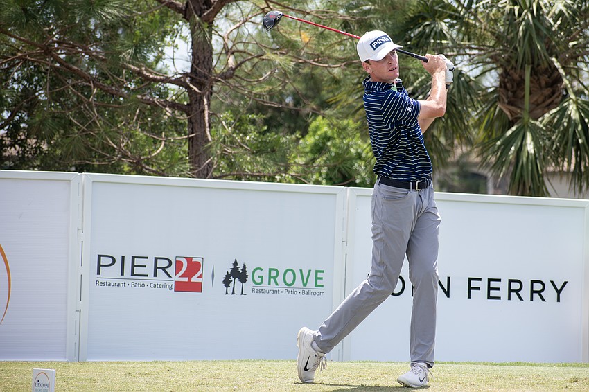 Logan McAllister hits his tee shot on the No. 10 hole at Lakewood National.