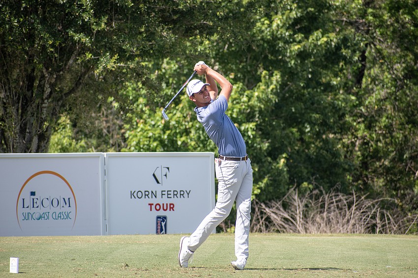 Mac Meissner hits his tee shot on the No. 17 hole at Lakewood National. After shooting 12 under par on Friday, Meissner finished the tournament at 15 under par.