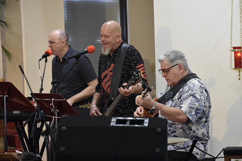 Trevor Pike, Matthew Stalo, and Bill Smith of X-Claim! Praise Band provide a special 75th anniverary performance for Trinity United Methodist Church.