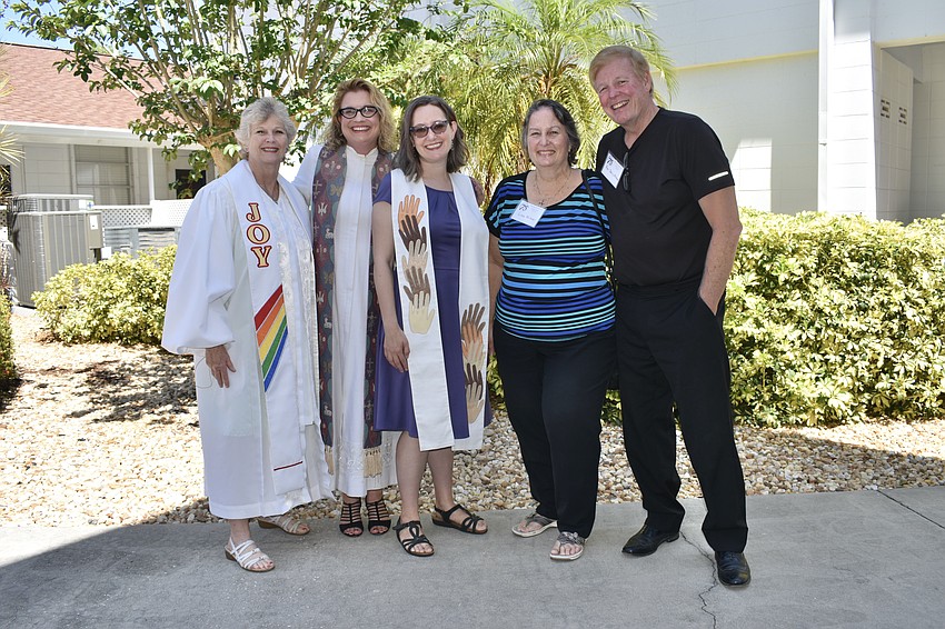 Rev. Linda Tice, senior pastor at Trinity; Rev. Deborah Allen, southwest district superintendent for the Florida Conference of the United Methodist Church; Rev. Beth Bostrom, regional team leader for the conference's Disaster Recovery Ministry; and Lisa and Rev. Jerry Milner, a former Trinity reverend