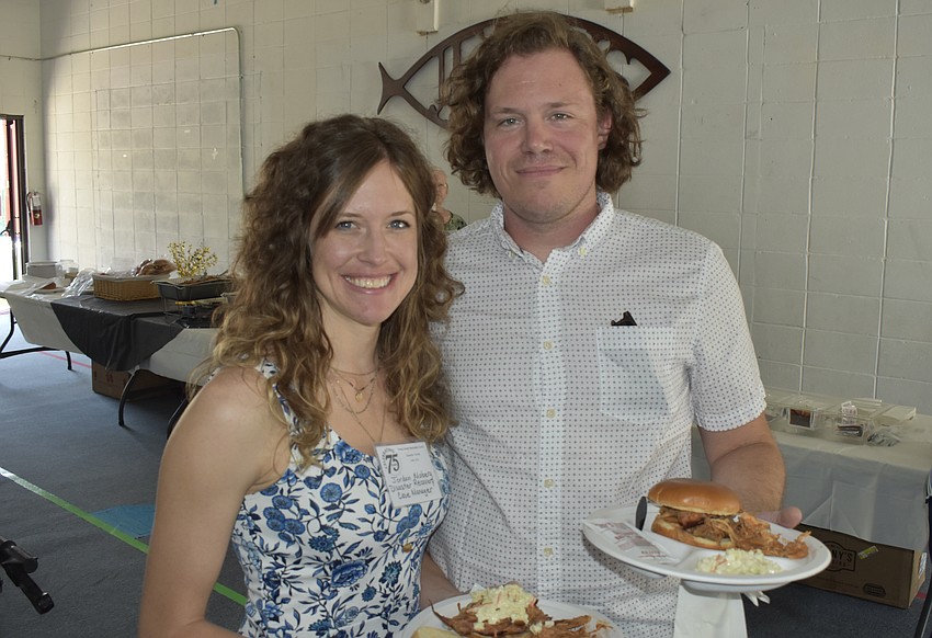 Jordan Moberg, Disaster Recovery Case manager with the Florida Conference of the United Methodist Church, and Kyle Upwood.