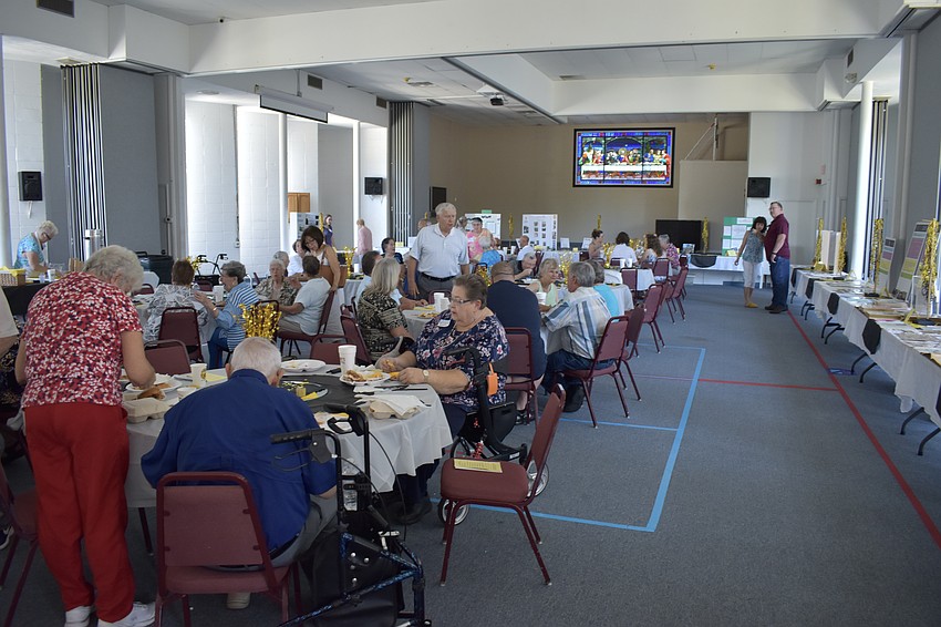 Members gather for lunch.