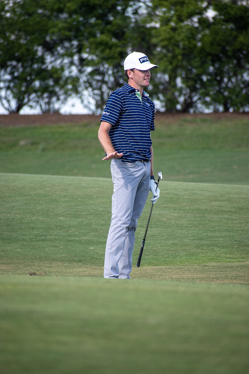 Logan McAllister begs for his shot to stop on the No. 18 green at Lakewood National.